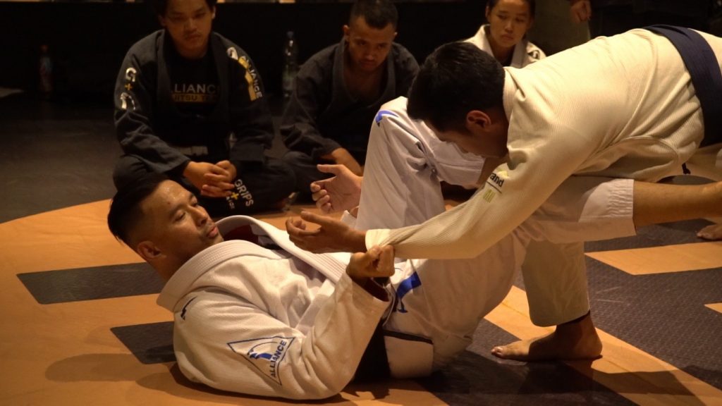 Alliance Jiu Jitsu Black Belt Prof. Deddy Wigraha teaches a guard technique.