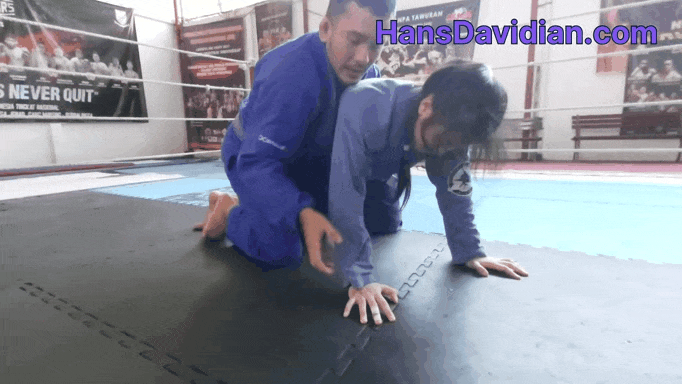 Finishing the first half guard sweep sequence by getting the back mount.