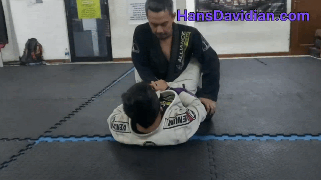 Back take from closed guard first step.